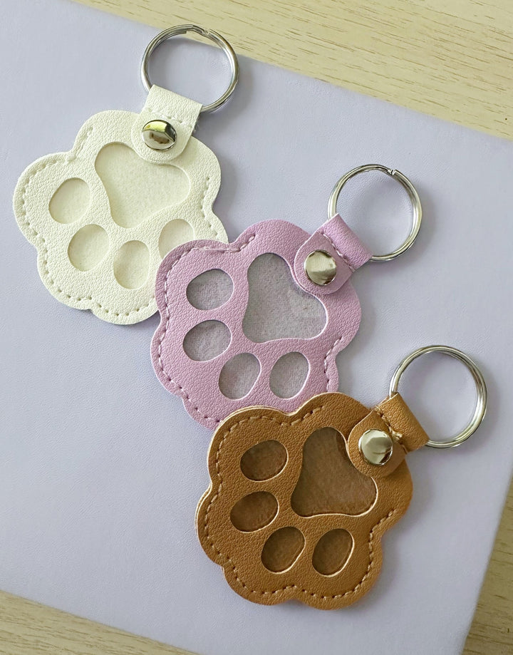 Porte-clés patte chien poils